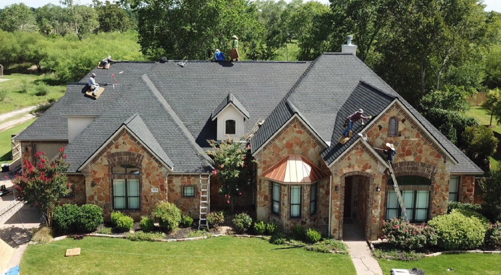 True Line Roofing crew on the job