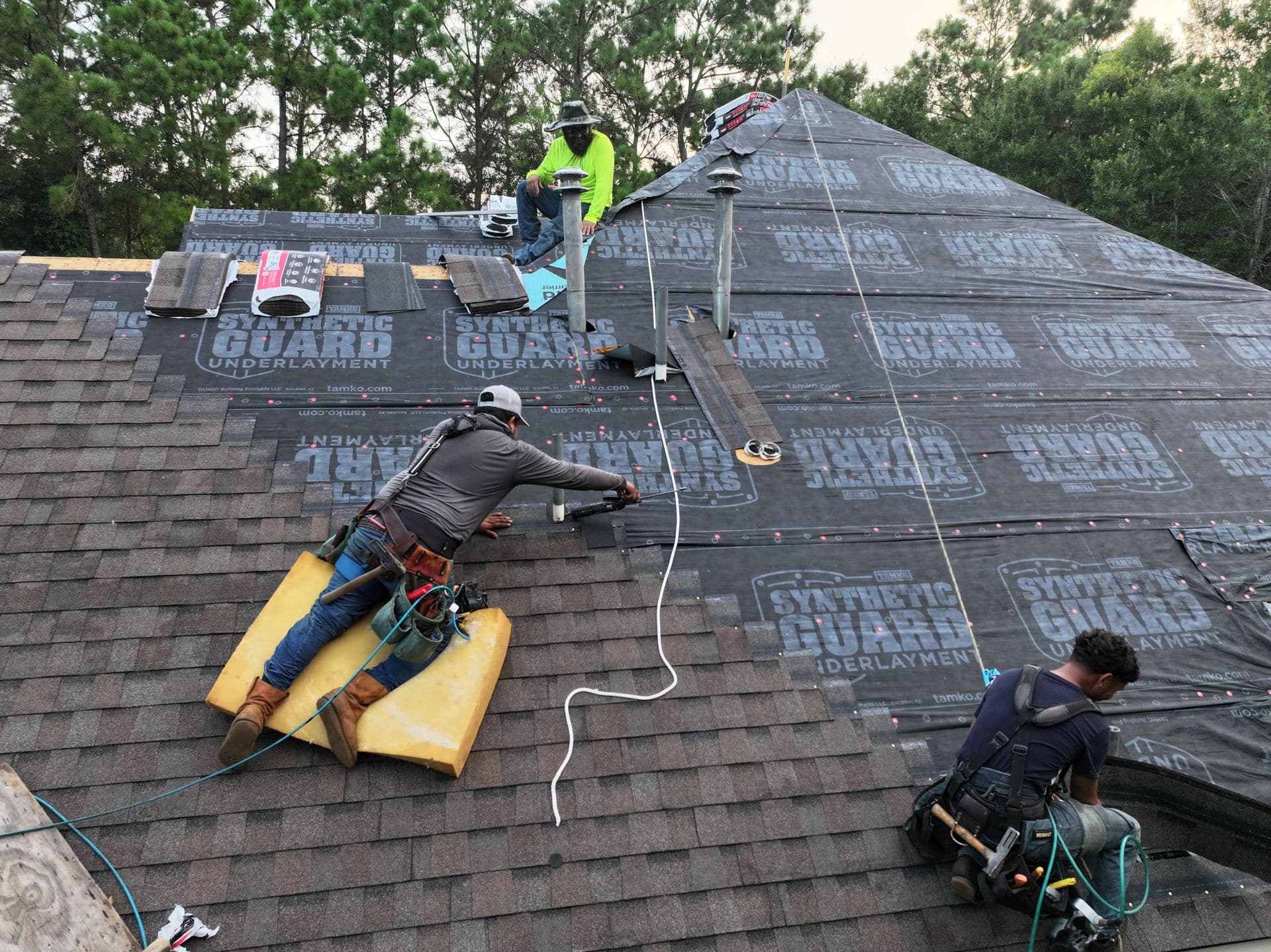 Crew Installing Architectural Shingles