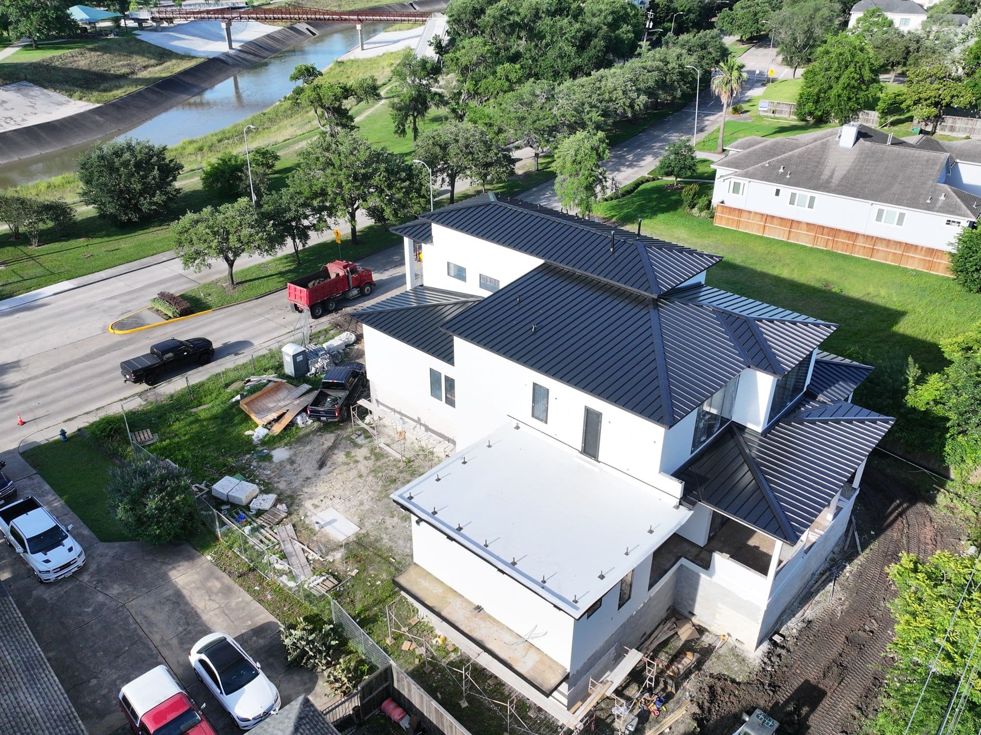 Metal & Flat Roof · Modern Home