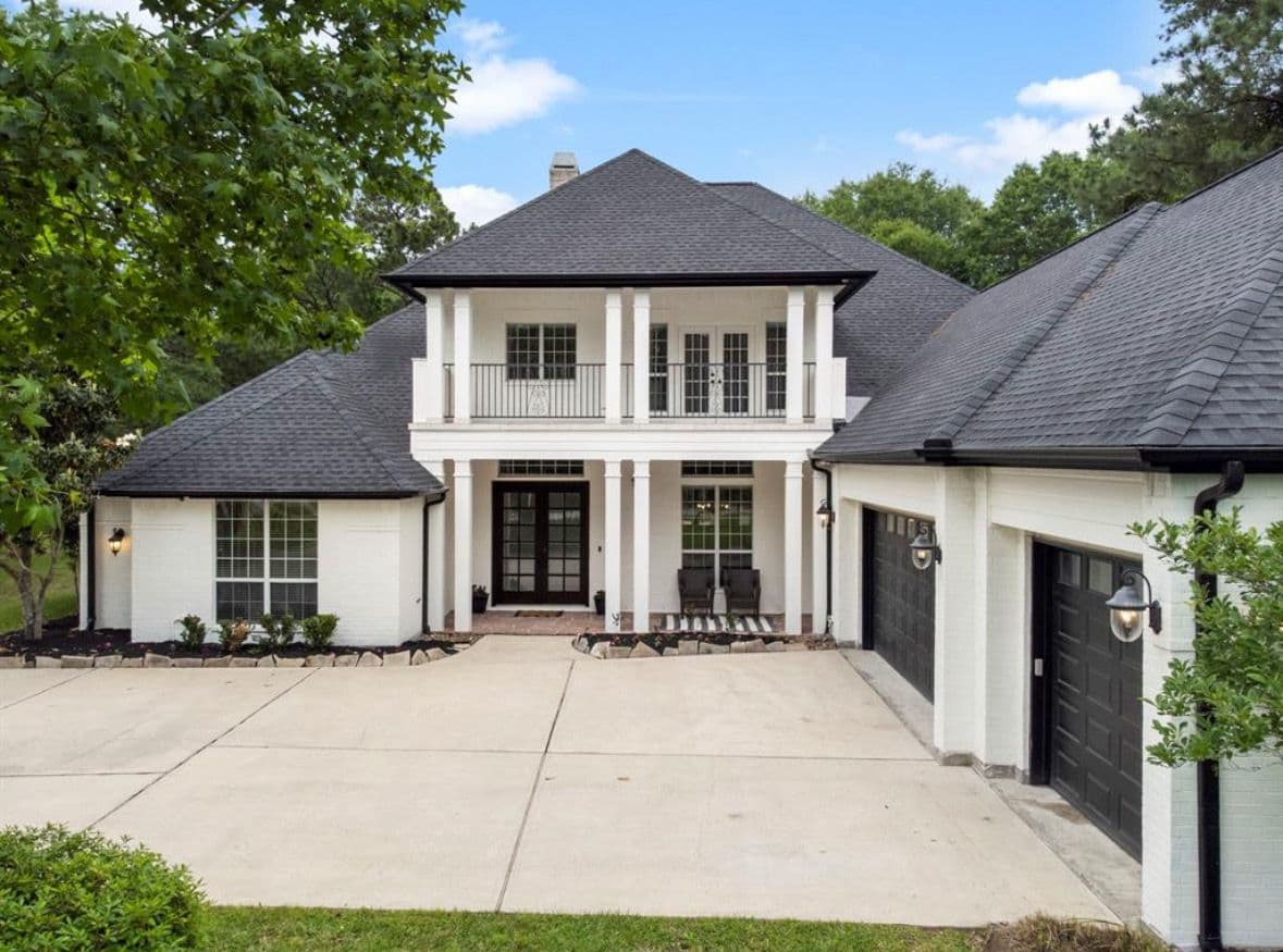 Completed Shingle Roof · Two-Story Home