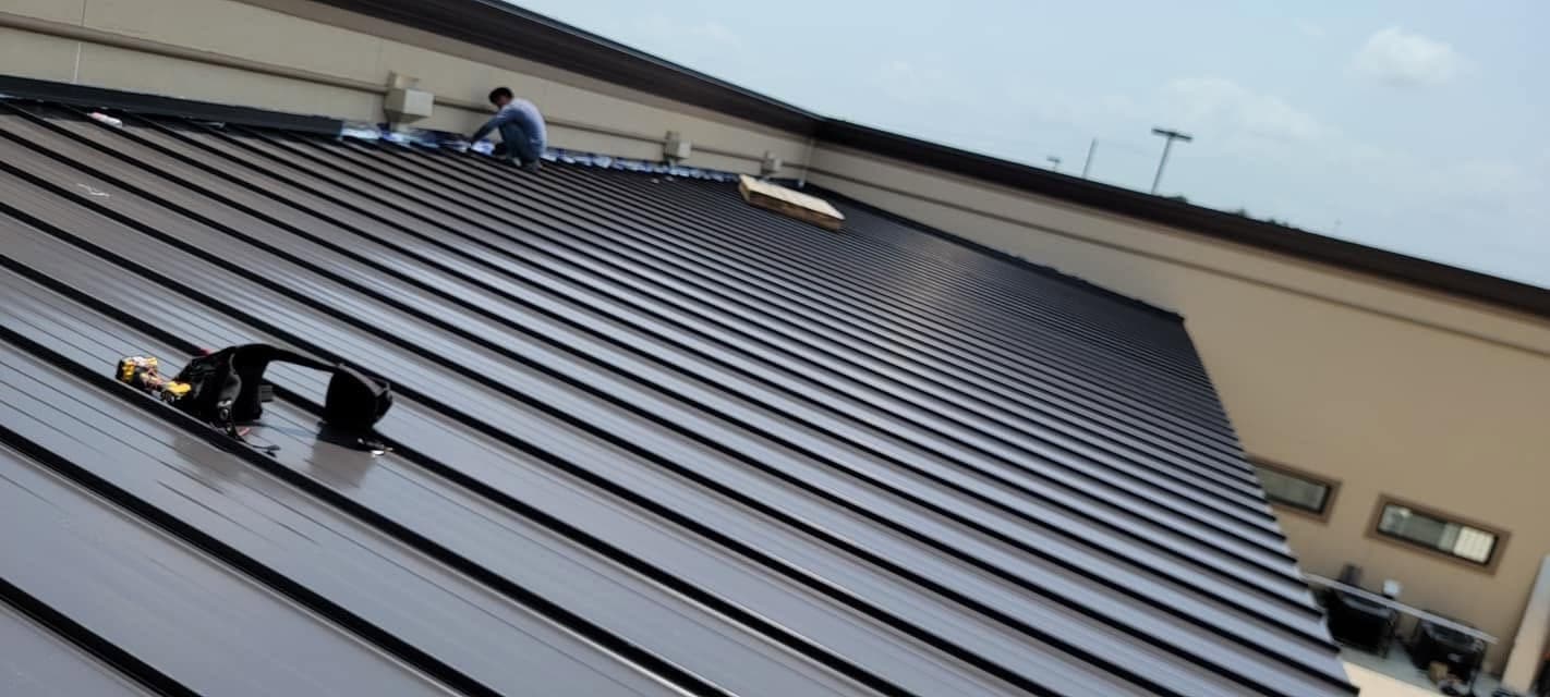 Crew Installing Commercial Metal Panels
